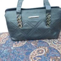 کیف|کیف، کفش، کمربند|مسجد سلیمان, |دیوار