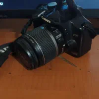 دوربین عکاسی کانن و سه پایه حرفه ای