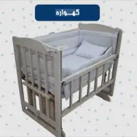 تخت چوبی نوزاد
