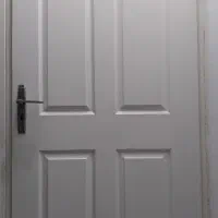 درب چوبی ورودی همراه با چهارچوب