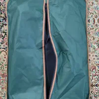 کت و شلوار|لباس|قم, باغ کرباسی|دیوار