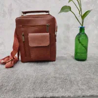 کیف وکمربند وکیف جیبی چرم مصنوعی دست دوز