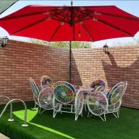 مبلمان چهار نفره و تاب و چتر باغی
