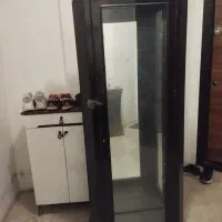 بوفه چوبی دارای چراغ تزئینی وبدون طبقه