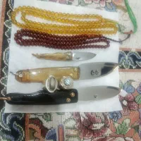 چاقو ،تسبیح سندلوس و کهربا انگشتر نقره
