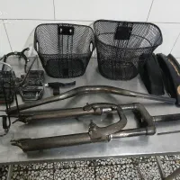 تعدادی وسایل دوچرخه + و ۲ عدد ریگ و لاستیک ویلچر