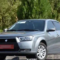 دنا پلاس خاکستری 6 دنده 1404 با رینگ