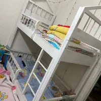 تخت چوبی دو طبقه