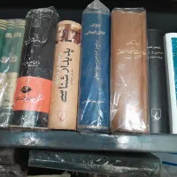 قرآن رهنما ۴ جلد|کتاب و مجله تاریخی|تهران, میدان ولیعصر|دیوار
