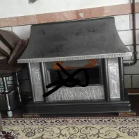 بخاری و آینه شمع دان