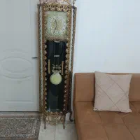 ساعت برنزی ایستاده