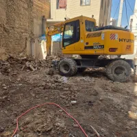 خاکبرداری و حمل خاک با بیل میکانیکی وبابکت