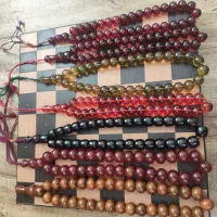 تسبیح و انگشتر و چاقو و ساعت