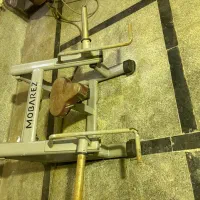 دستگاه جلو‌بازولاری وزنه ازاد و‌ دستگاه شراگ نشسته
