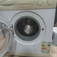 لباسشویی کنوود ب شرط سلامت|ماشین لباسشویی و خشک‌کن لباس|رشت, استقامت ۱|دیوار