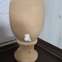 کوزه سفالی شیر دار