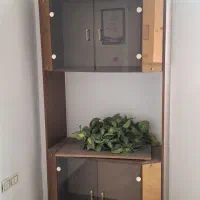 زیر تلویزیون و بوفه قدیمی