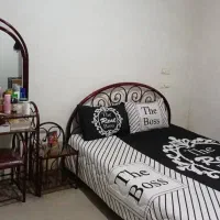 تخت خواب و میز آرایش و میز تلویزیون