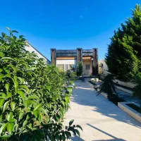 فلت-حیاط-دار-مشجر-با-سندتکبرگ-قیمت-کل