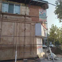 داربست فلزی و تخته زیر پایی