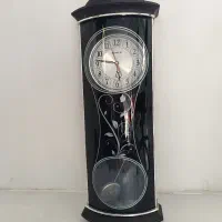 ساعت دیواری به همراه تابلو اشانتیون