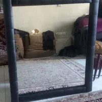 آینه بزرگ و نو با دور چرم مشکی