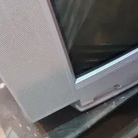 تلویزیون به همراه میز تلویزیون ۲ تومان