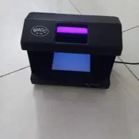 دستگاه تشخیص دلار
