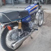 موتو ۱۲۵ کویر|موتورسیکلت|آبپخش, |دیوار