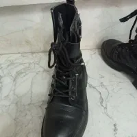 پوتین زنانه|کیف، کفش، کمربند|قدس, شهر‌قدس|دیوار