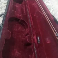 ویولون در حد نو|ویولن|قدس, شهرقدس|دیوار