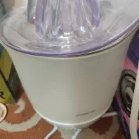 آب میوه گیری برقی