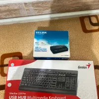 مودم تی پی‌لینک و کیبرد جینیوس