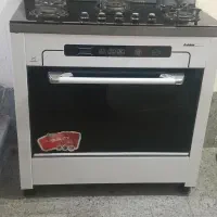 اجاق گاز پنج شعله درحد نو همراه دوتا گلیم فرش