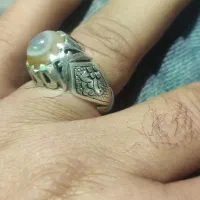انشگتر نقره با سنگ باباقوری یا سه پوست
