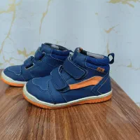 پوتین و کاپشن بچگانه