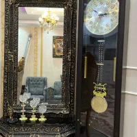 ساعت ایستاده و ایینه کنسول