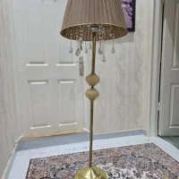 آباژور و ساعت ایستاده طلایی