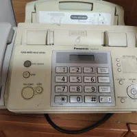 یک دستگاه فاکس (تلفن وکپی)