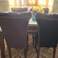 میزناهارخوری میزشش نفره اماچهارتاصندلی دارد