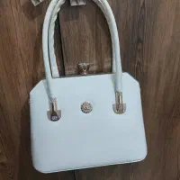 تعدادی مانتو و یدونه کیف مجلسی شیری|لباس|قدس, شهرقدس|دیوار