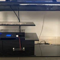 میز تلویزیون شیشه‌ای