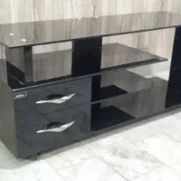 میز تلویزیون شیشه‌ای