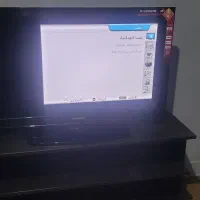 ال ای دی ایکس ویژن ۴۰ اینچ به اضافه میز تلویزیون