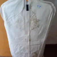 یک کت شلوار شیک سفید مجلسی نونو