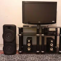 تلویزون و اسپیکر و باند و میز