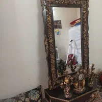 آینه و ساعت و موجسمه