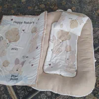 تشک گارد دار و آغوش برای نوزاد