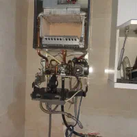 تعمیرات تخصصی پکیج/تعمیرات کولرگازی/نصب کولرگازی|خدمات پیشه و مهارت|رباط‌کریم, رباط‌کریم|دیوار