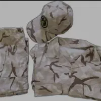 یک دست لباس سربازی با پوتین نو